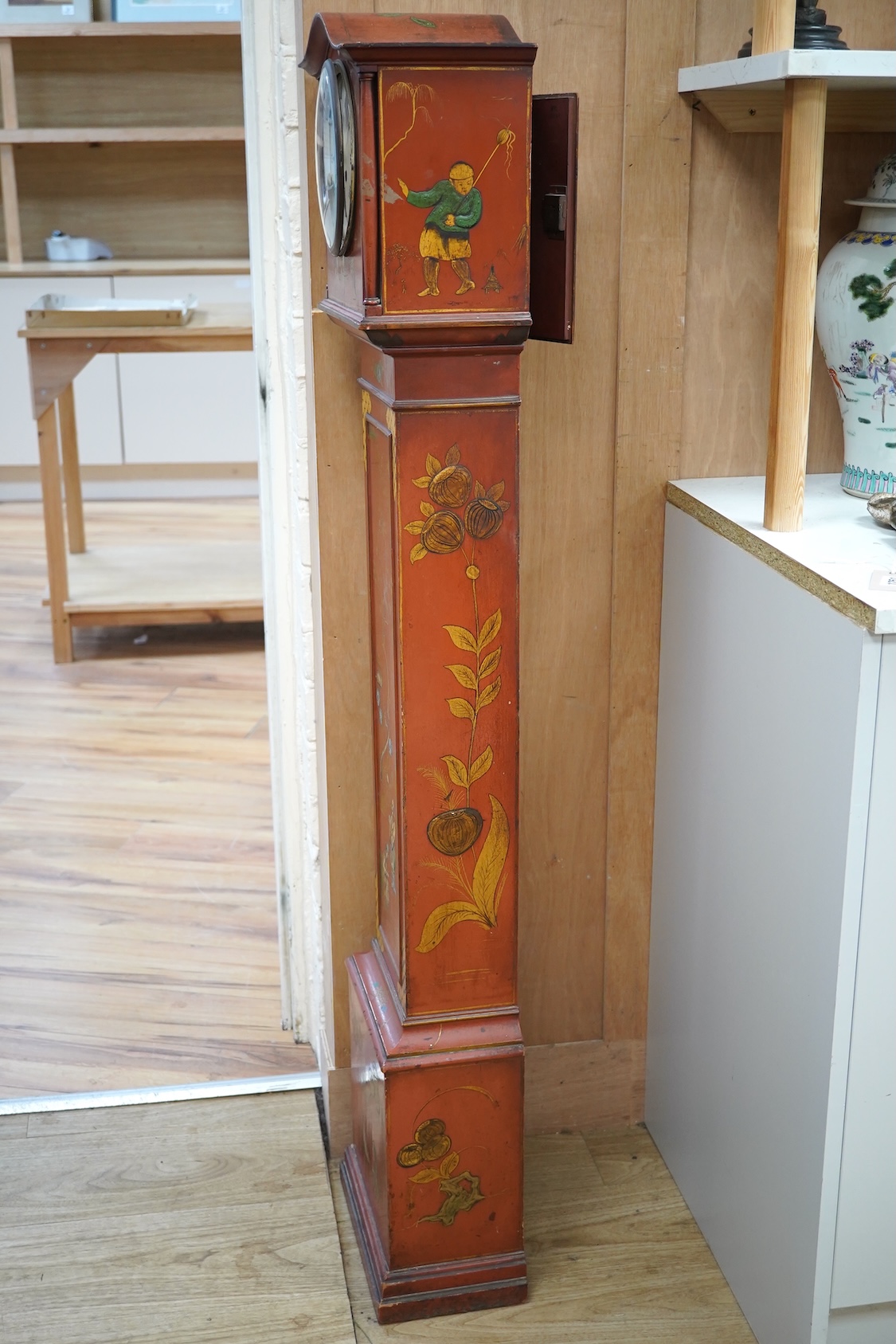 A 1930's Japanned grandmother clock with Roman numeral dial. Condition - poor, cracked and chipped